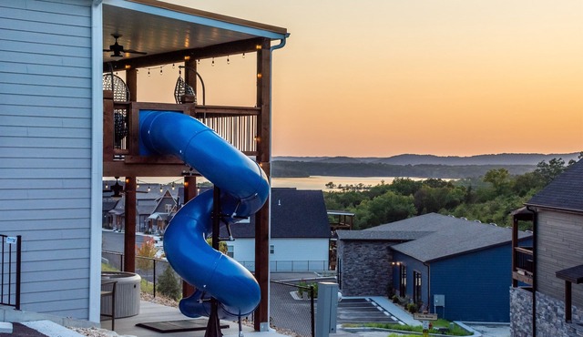 Twisty slide, Lake view, Hot tub, Indoor pool, Fire pit | Skye Retreat