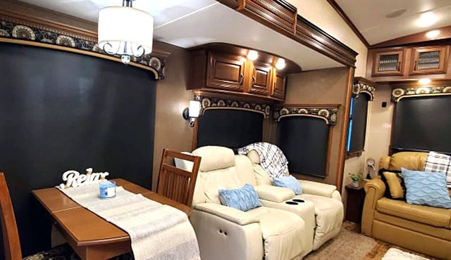 Two bath fully stocked RV with free golf cart