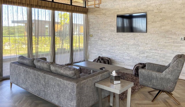 Two bed lodge with one king-size bed and one twin (King by arrangement).