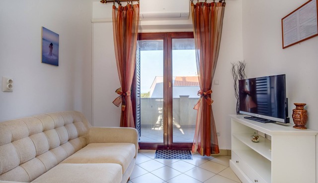 Two bedroom apartment with terrace and sea view Mali Lošinj, Lošinj (A-7879-c)
