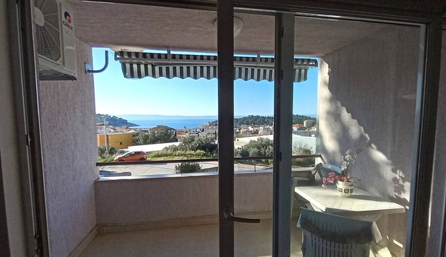 Two bedroom apartment with terrace and sea view Makarska (A-19756-a)