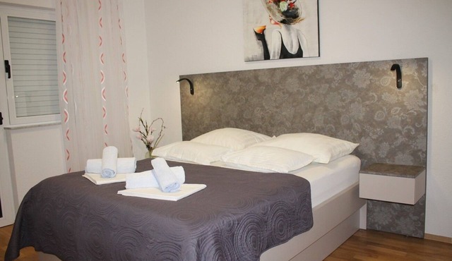 Two bedroom apartment with balcony and sea view Makarska (A-21911-c)