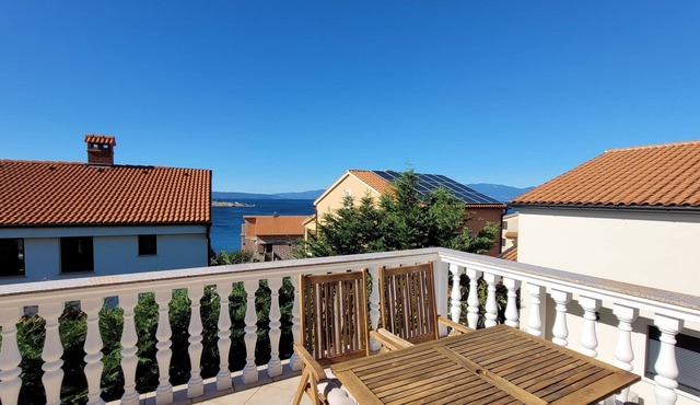 Two bedroom apartment with terrace and sea view Omišalj, Krk (A-19410-a)
