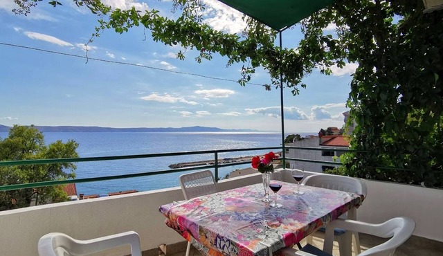 Two bedroom apartment with balcony and sea view Živogošće - Porat, Makarska (A-16289-d)