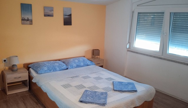 Two bedroom apartment with terrace and sea view Povljana, Pag (A-17222-a)