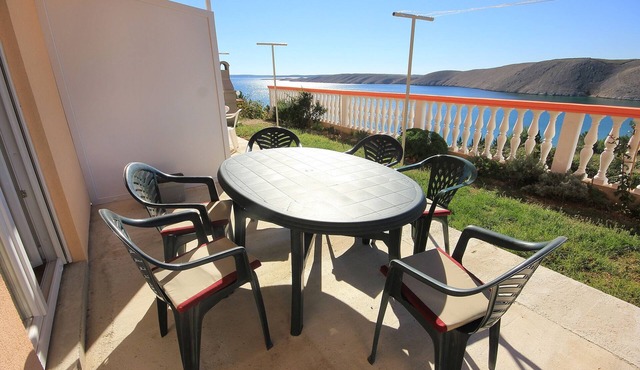 Two bedroom apartment with terrace and sea view Vlašići, Pag (A-9324-a)