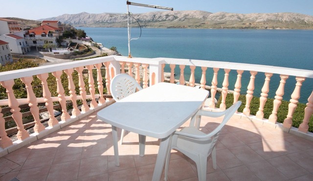 Two bedroom apartment with terrace and sea view Zubovići, Pag (A-6394-b)