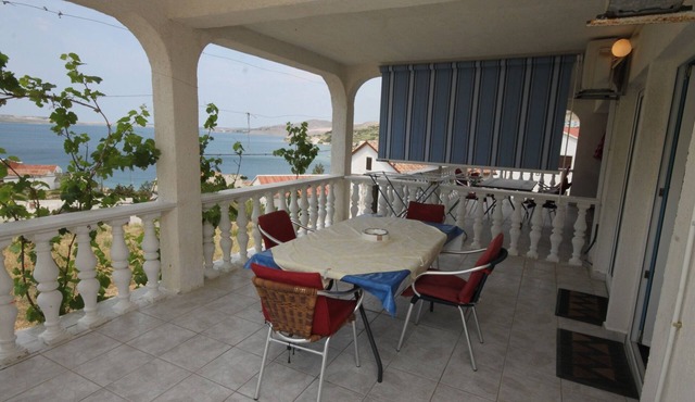 Two bedroom apartment with terrace and sea view Metajna, Pag (A-6426-c)