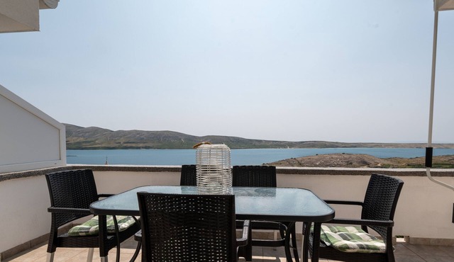 Two bedroom apartment with terrace and sea view Zubovići, Pag (A-9365-b)
