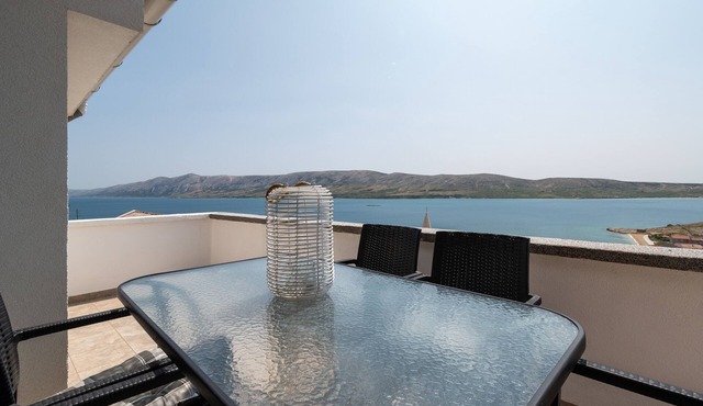 Two bedroom apartment with terrace and sea view Zubovići, Pag (A-9365-a)
