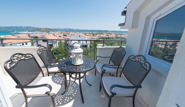 Two bedroom apartment with terrace and sea view Murter (A-16655-f)