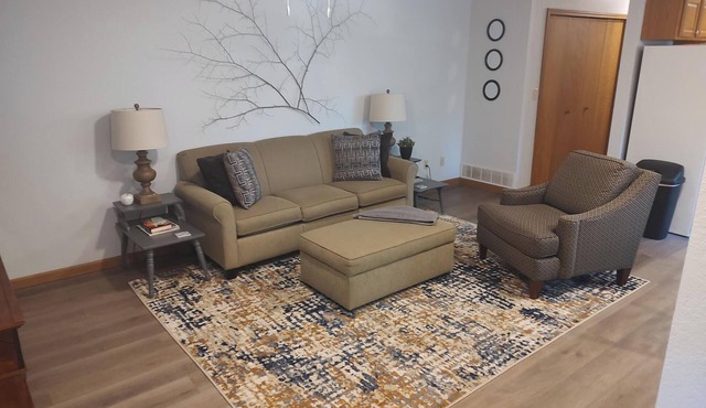 Two - bedroom apartment with deck and firepit.