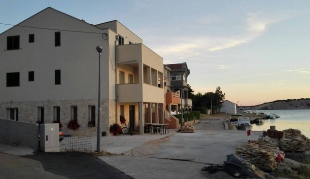 Two bedroom apartment with balcony and sea view Šimuni, Pag (A-18386-a)