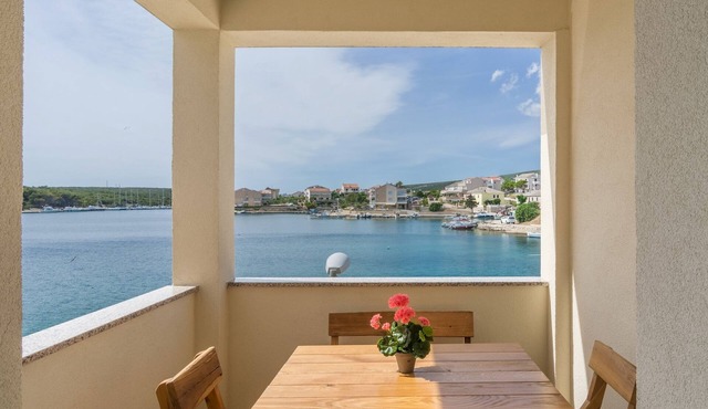 Two bedroom apartment with balcony and sea view Šimuni, Pag (A-18386-b)