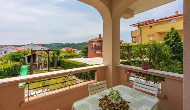 Two bedroom apartment with terrace Lopar, Rab (A-18388-a)