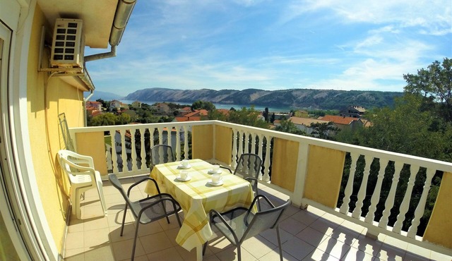 Two bedroom apartment with terrace and sea view Lopar, Rab (A-19238-a)