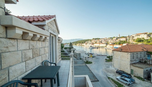 Two bedroom apartment with terrace and sea view Povlja, Brač (A-12352-a)