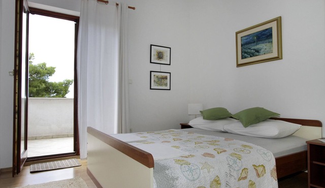 Two bedroom apartment with terrace and sea view Trogir (A-11895-b)