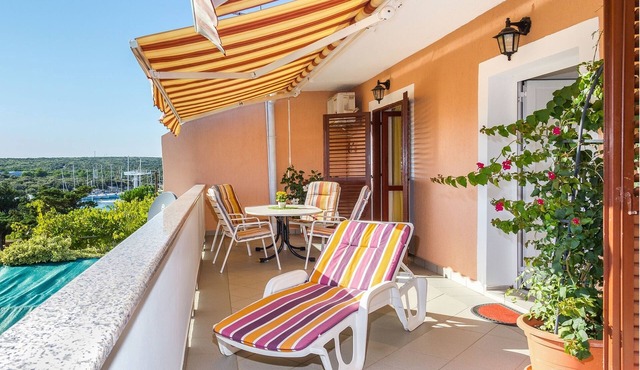 Two bedroom apartment with terrace and sea view Šimuni, Pag (A-4083-a)