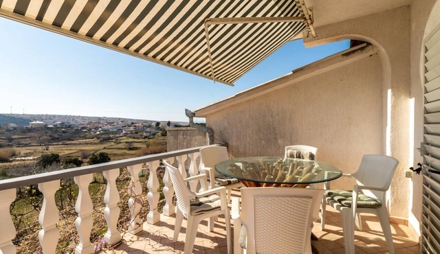 Two bedroom apartment with terrace Lopar, Rab (A-14070-b)