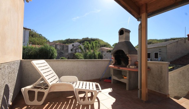 Two bedroom apartment with terrace and sea view Susak, Lošinj (A-8050-e)