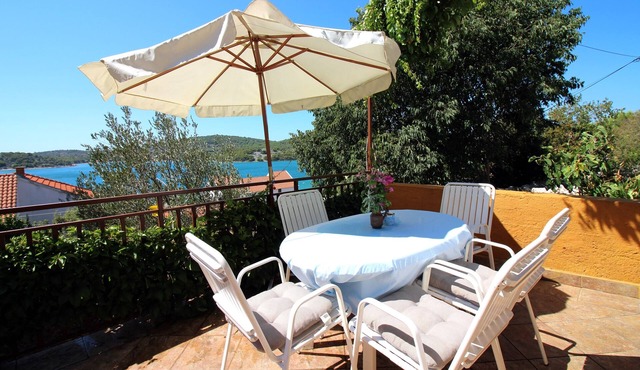 Two bedroom apartment with terrace and sea view Tisno (Murter) (A-5136-b)