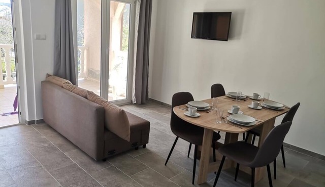 Two bedroom apartment with balcony Lopar, Rab (A-23825-a)