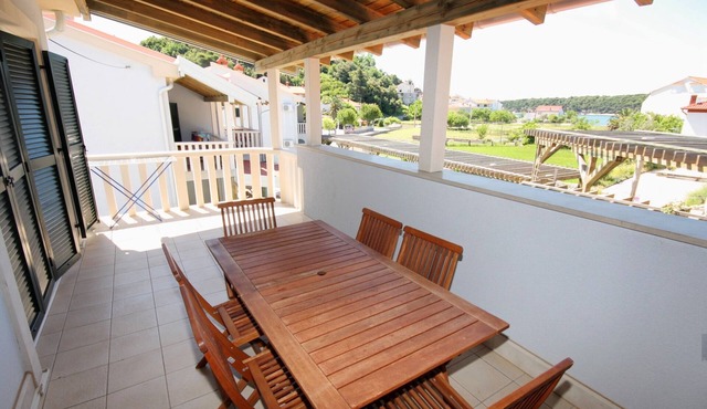 Two bedroom apartment with terrace and sea view Palit, Rab (A-3212-c)