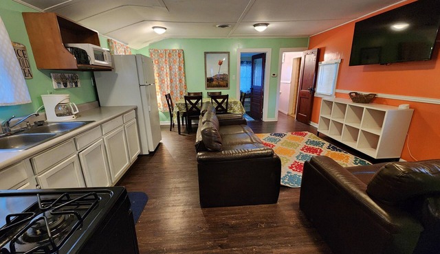 Two Bedroom Cabin - Street & Pool View - Two bedroom cabin conveniently located at Outrigger Resort, right down the road from Indiana Beach Amusement Park! This 600 sq ft classic cabin offers two (2) queen beds and two (2) futons to sleep six (6)! Am