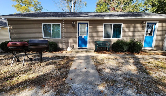 Two Bedroom Cabin - "The Big One" - This spacious cabin gets it's name honestly! Cabin is 800 sq ft with two-bedrooms feature three (3) queen beds, one (1) full size bed, and two (2) futons allow for a max of twelve (12) people. Conveniently located