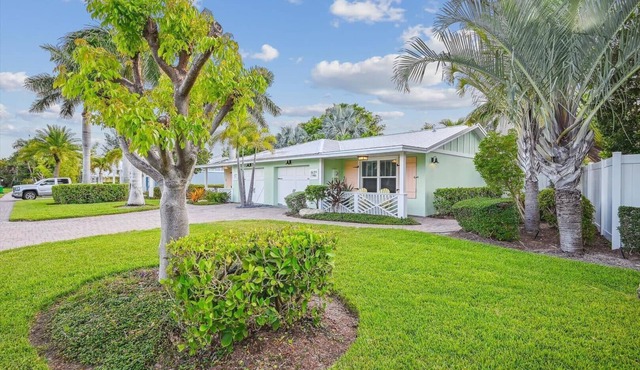 Two Bedroom Cottage with Tropical Landscaping Surrounding Private Heated Pool!