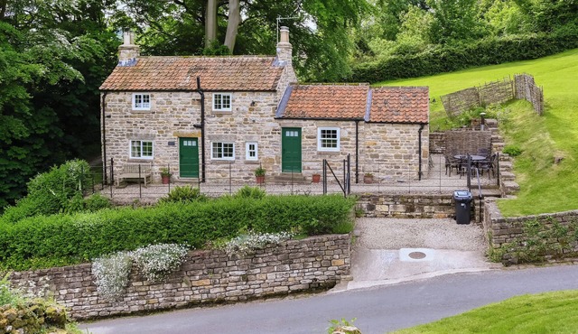 Two bedroom cottage packed with character with stone floors and wood burner.