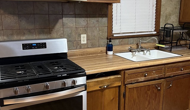 Two bedroom house with private backyard and patio