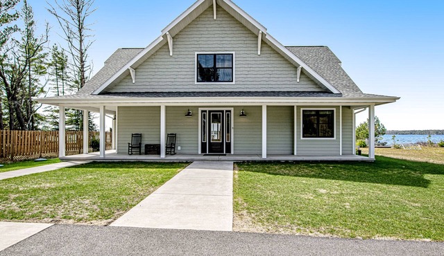 Two dog-friendly lakefront homes with docks, kayaks, rowboat, firepits & beach
