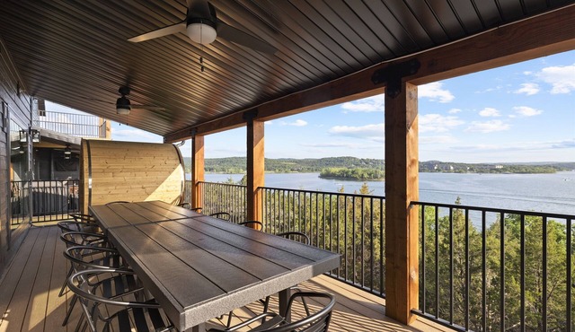 Two homes (sleeping 50) golf simulator, outdoor sauna, hot tub & fire table