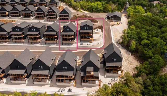 Two homes (sleeping 51) golf simulator, outdoor sauna, hot tub & fire table