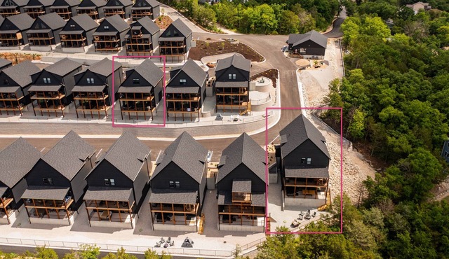 Two homes (sleeping 51) golf simulator, outdoor sauna, hot tub & fire table