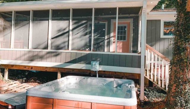 Two lakefront cabins next door