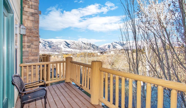 Two level condo with gourmet kitchen, upstairs remodel, and outdoor wonderland.