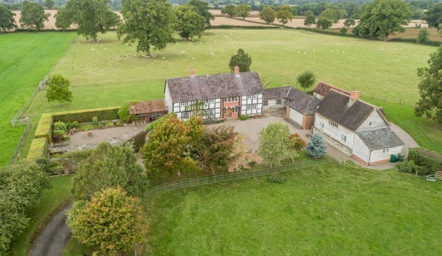 Two properties next door to each other with a games room, hot tub and bicycles
