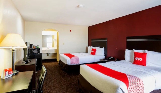 Two-Queen Room Sanctuary | Family-Friendly Stay Near LSU and Popular Dining Spot