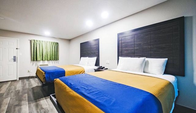 Two Queen Beds Non Smoking Room at Scottish Inns and Suites!