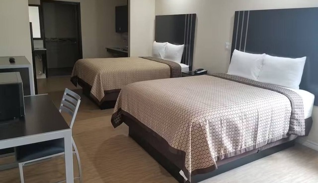 Two Queen Non-Smoking Room, Scottish Inns and Suites Bay City TX, Free Parking