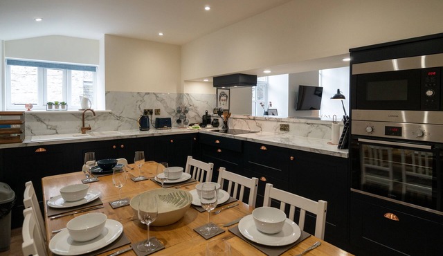 Two separate 2-bedroom apartments, joined by a private hallway. Kendal Town Centre