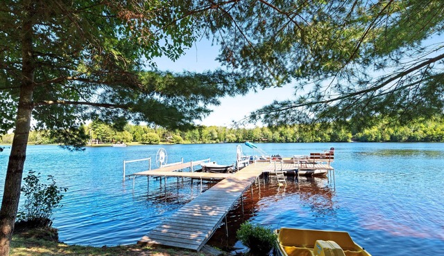 Two separate family-friendly lakefront cabins w/dock and firepit