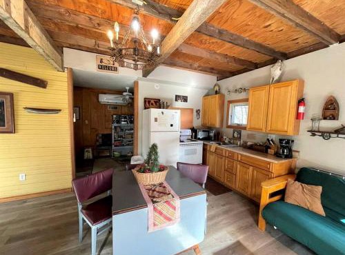 Two-Story Cabin Rental for Large Groups along Hamilton Creek in Marble Falls, Texas