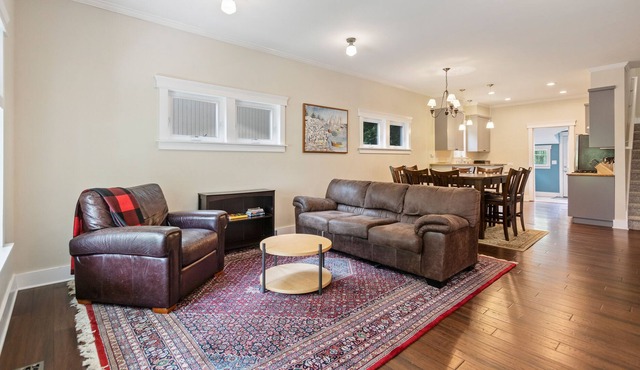 Two-story, dog-friendly home with a fenced yard, patio & washer/dryer