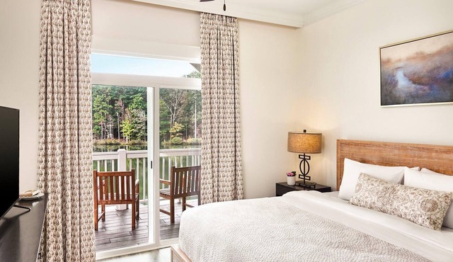 Two-Story Villa Overlooking Lunker Lake w/Kitchenette, WiFi, & Covered Porch