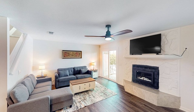 Two-story waterfront retreat with a furnished deck, washer/dryer, & AC