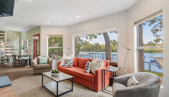 Two-story waterfront retreat with boat dock, two firepits & two kayaks